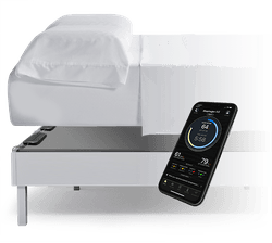 2 sleeptracker sensors placed underneath a mattress shown with a smart phone and sleeptracker app